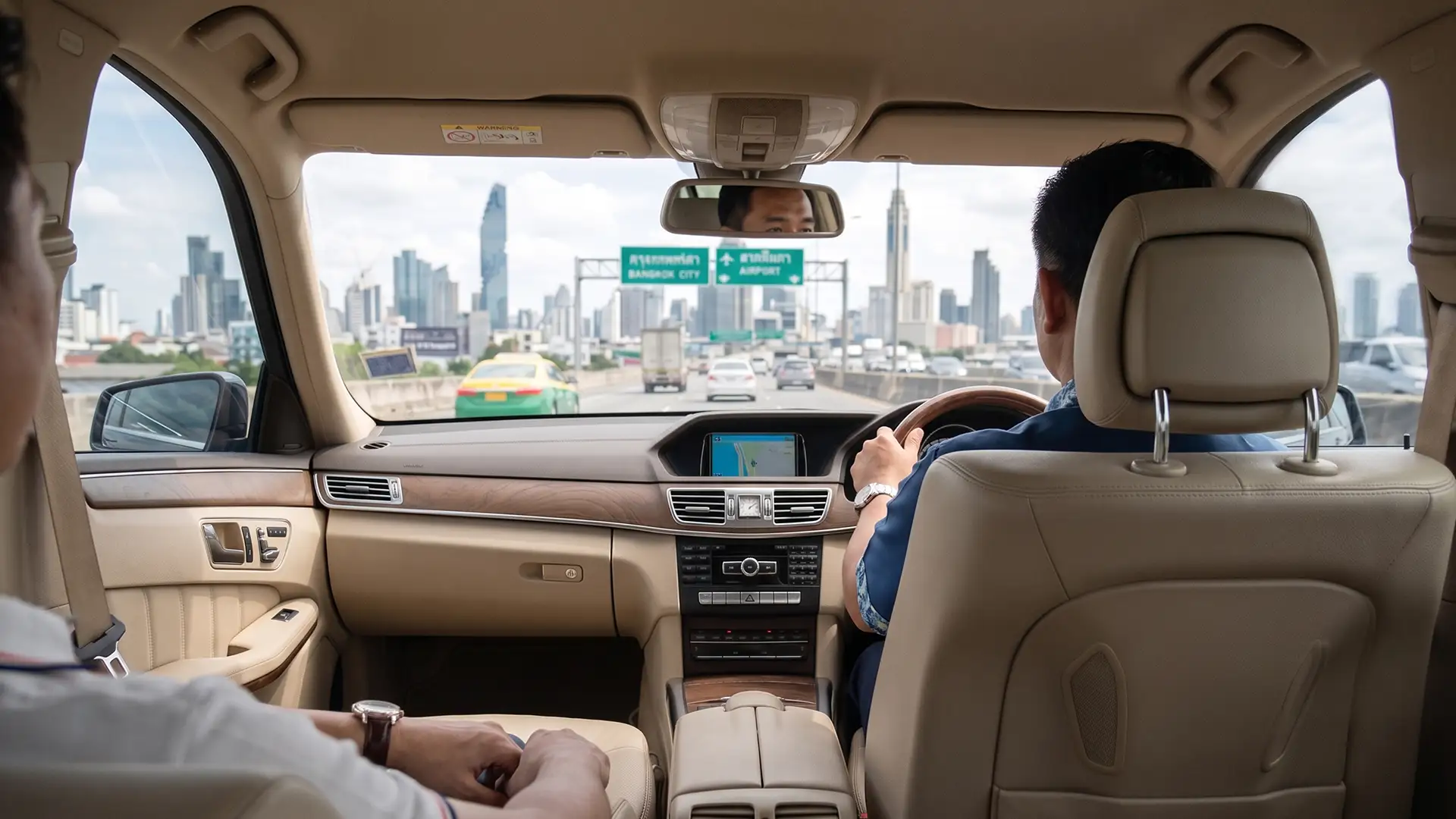 Quiet eco-friendly EV arriving at a hotel lobby — sustainable premium chauffeur service